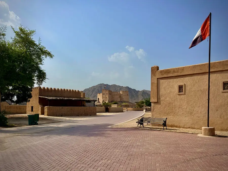 A restored stone fort below the mountains in Fujairah