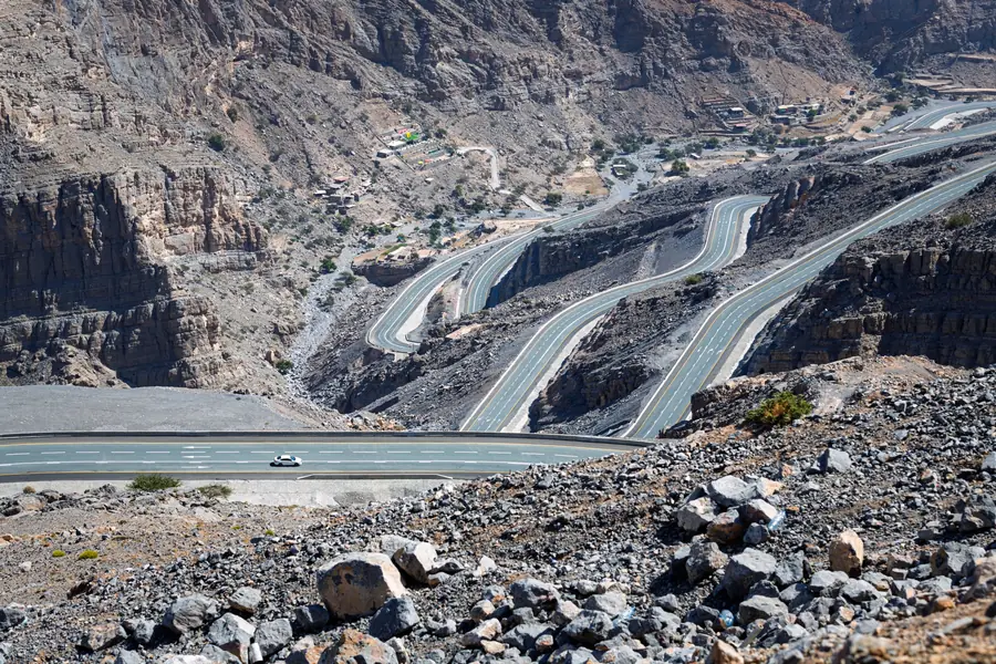 A switchback mountain road climbing the Ras Al Khaimah range