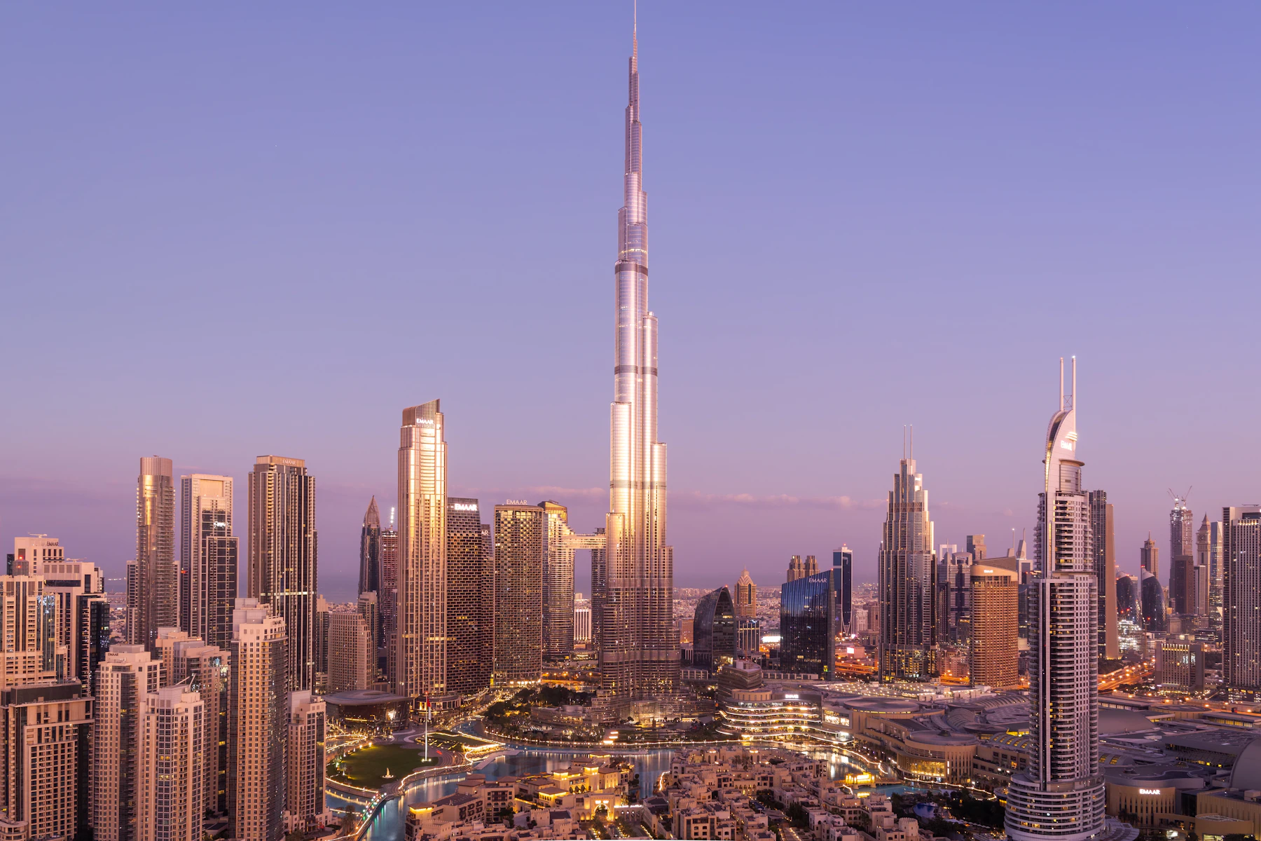 Burj Khalifa rising above Downtown Dubai at dusk